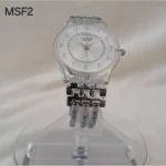 montre femme élégante swatch avec cadran transparent blanc