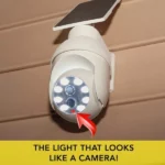 lampe solaire caméra de sécurité led 360° à détecteur de mouvement ontel handy brite security, ressemble à une caméra de surveillance