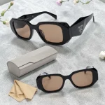 lunettes de soleil prada symbole 2026 noir verres marron