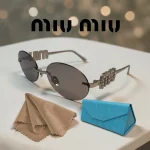 lunettes de soleil femme miu miu ovales sans monture petit monture rimless strass diamond gris