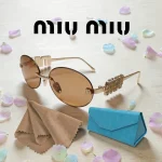 lunettes de soleil femme miu miu ovales sans monture rimless strass diamond miel-or