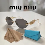 lunettes de soleil femme miu miu ovales sans monture petit monture rimless strass diamond noir-or