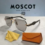 lunettes de soleil moscot octogonal sans contour rimless noir et or