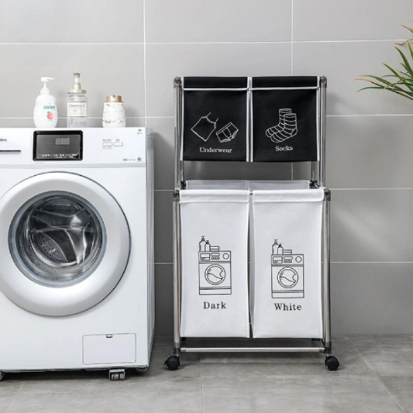 trieur à linge 2 niveaux 4 sacs amovibles et roulettes pour organiser couleurs claires et foncées
